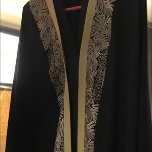 Elegant preacher robe with rope around Belt.